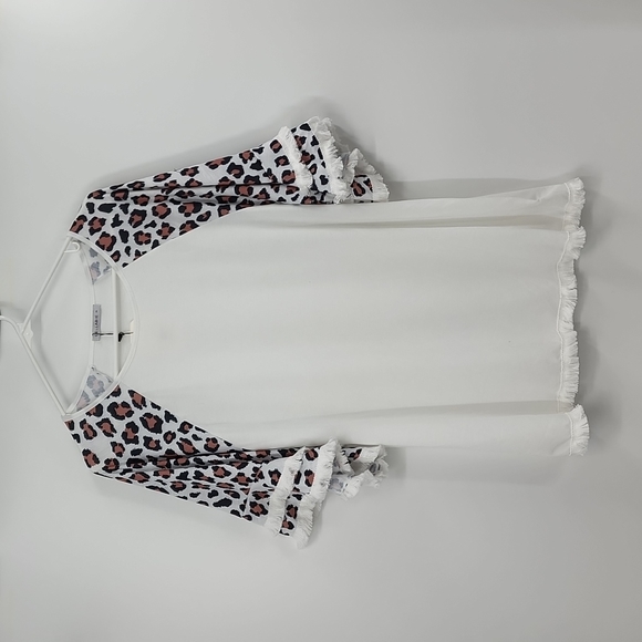 cellabie Tops - Nwt Cellabie white leopard sleeve fringe top